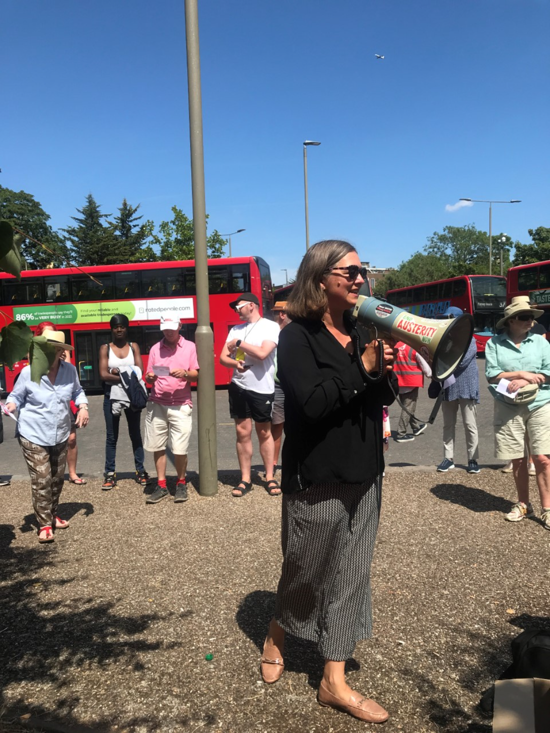 Fleur Anderson MP leading a public demonstration to save the 14 and 74 buses.